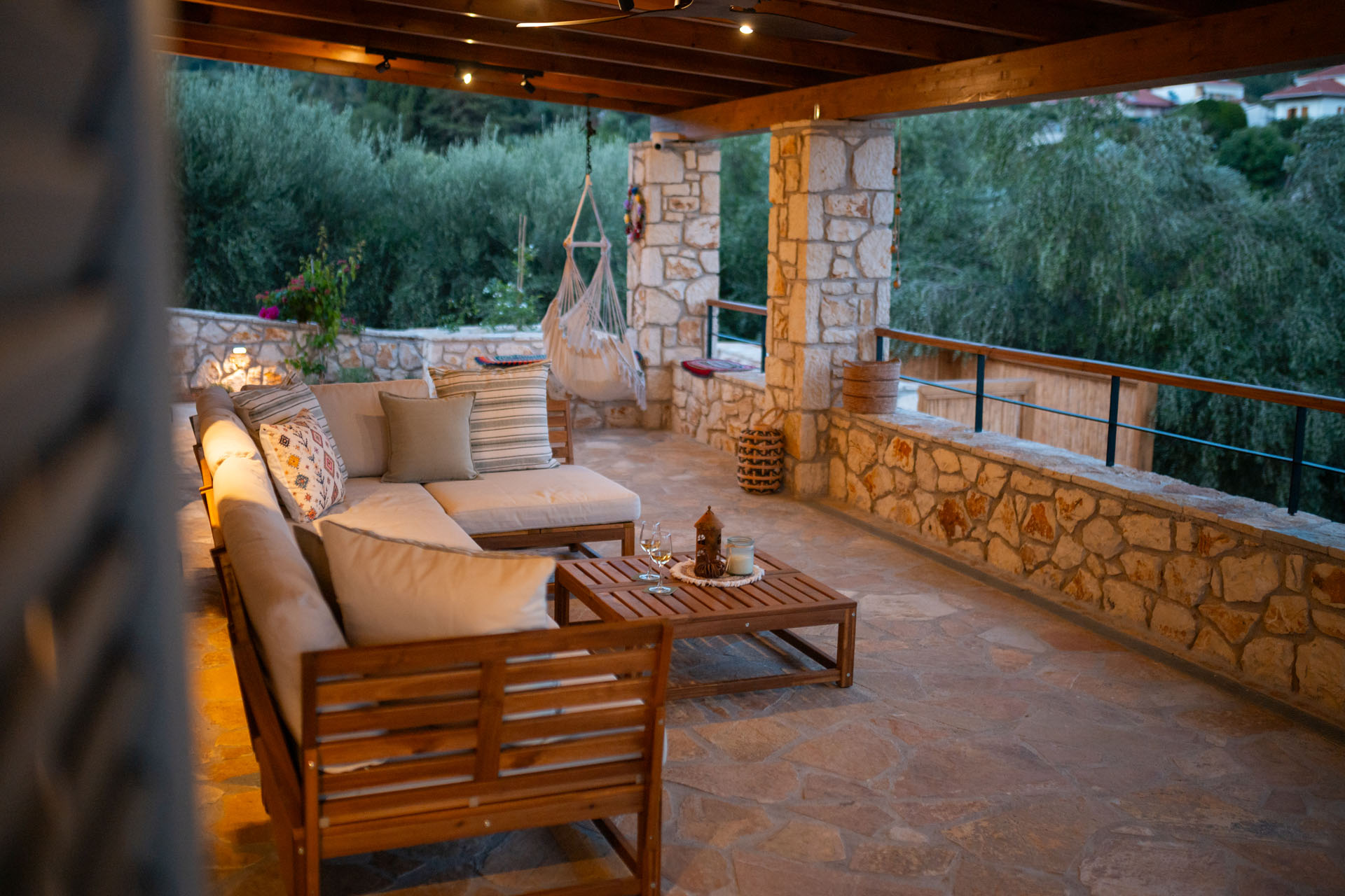 Outdoor lounge on the veranda in the evening
